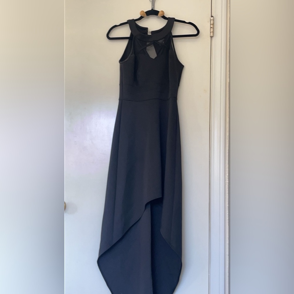 Sweet storm high low / halter black dress with see through detail
Size Small